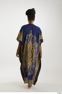 Dina Moses  1 back view dressed traditional decora long…